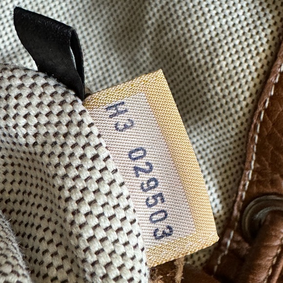Dooney & Bourke Pebbled Leather Drawstring Bag - Picture 8 of 13